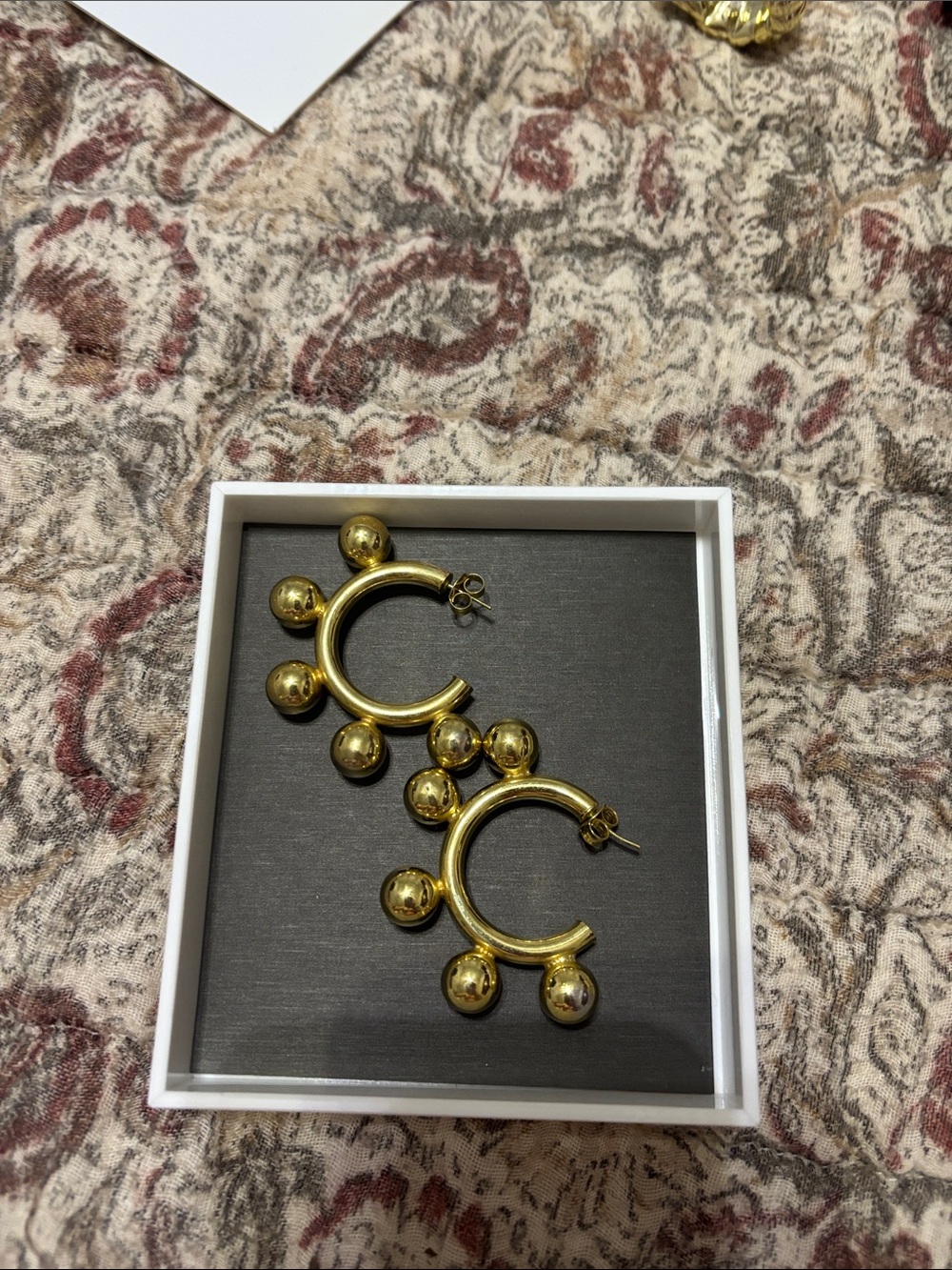 August gold earrings